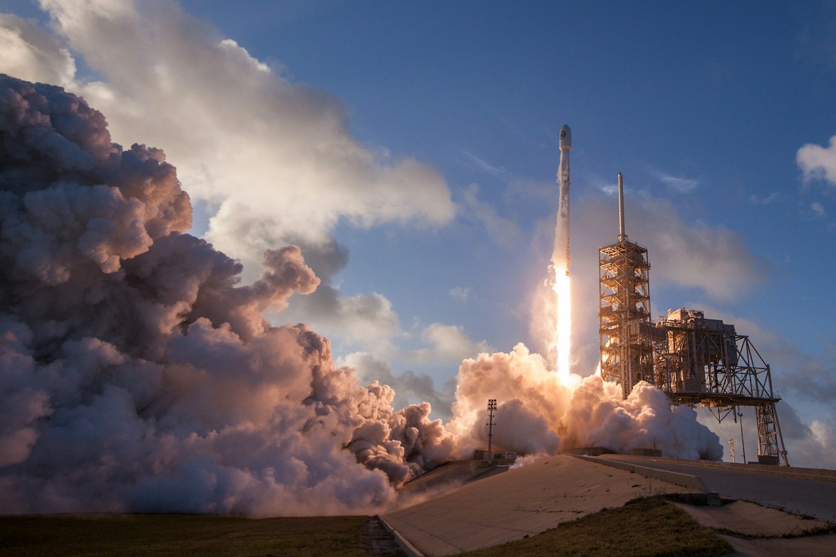 Rocket launch plume against sky (stock)